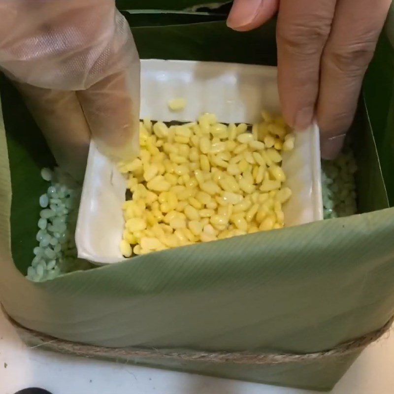 Step 4 Wrapping the cake Cooking sticky rice cake with a rice cooker