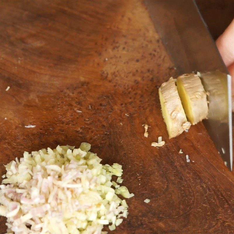 Step 2 Pounding the spice mixture for Grilled Chicken Spring Rolls