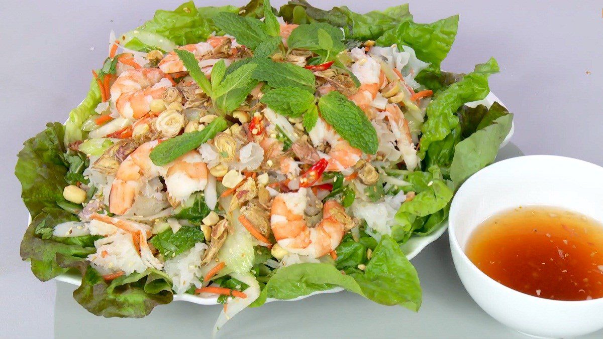 Snow mushroom salad with shrimp, meat, and lotus root