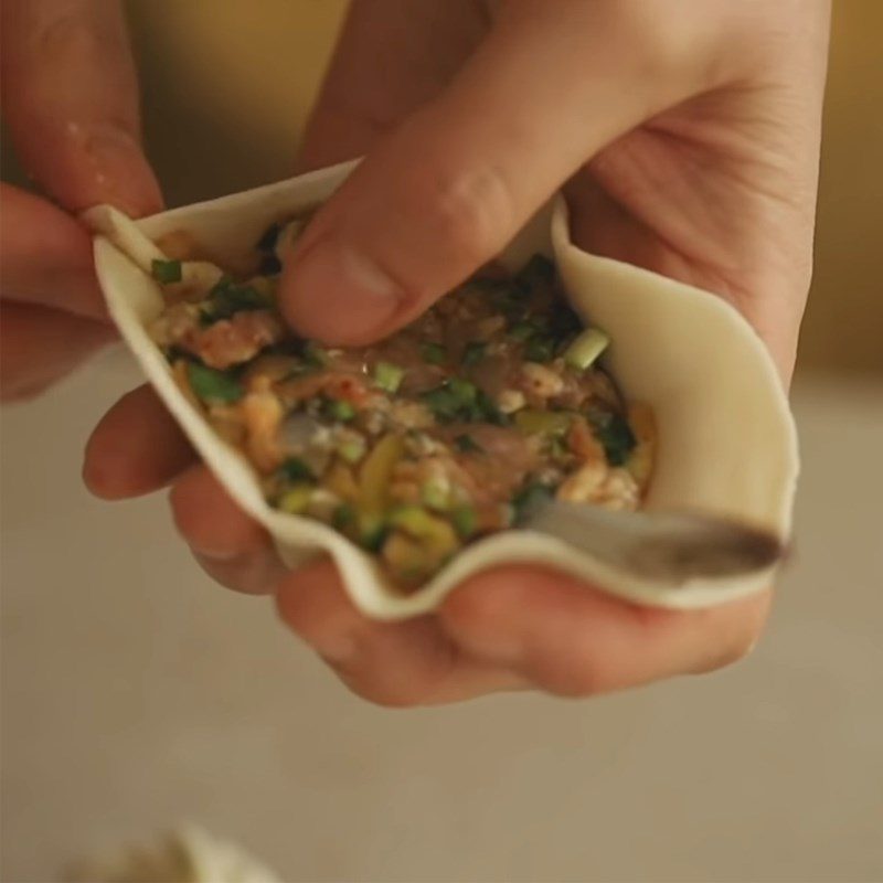 Step 5 Wrap the dumplings for shrimp zucchini dumplings