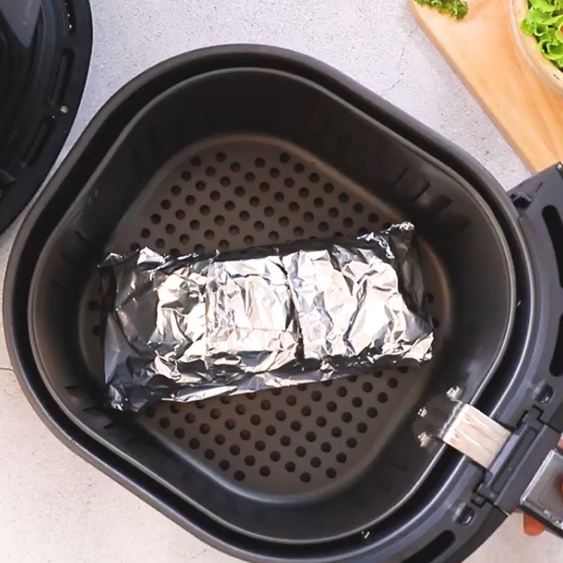 Step 3 Wrap and grill fish Grilled salmon in aluminum foil with asparagus