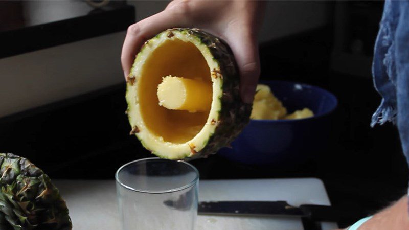 Scrape out the pineapple flesh