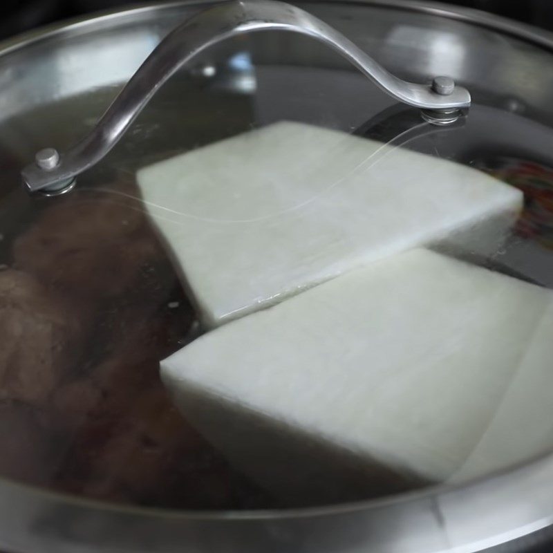 Step 2 Simmer the oxtail with radish Korean oxtail soup