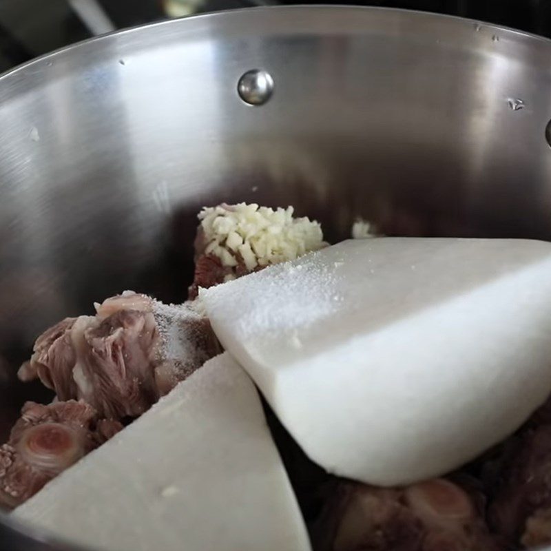 Step 2 Simmer the oxtail with radish Korean oxtail soup