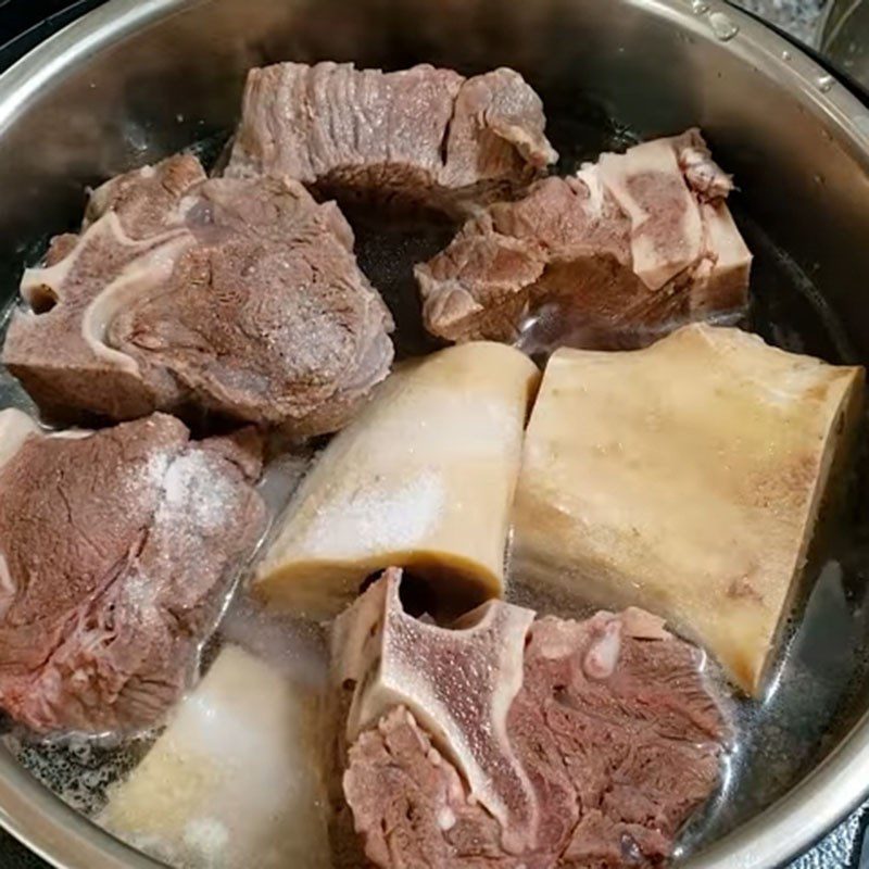 Step 3 Simmering bones for beef pho using a pressure cooker