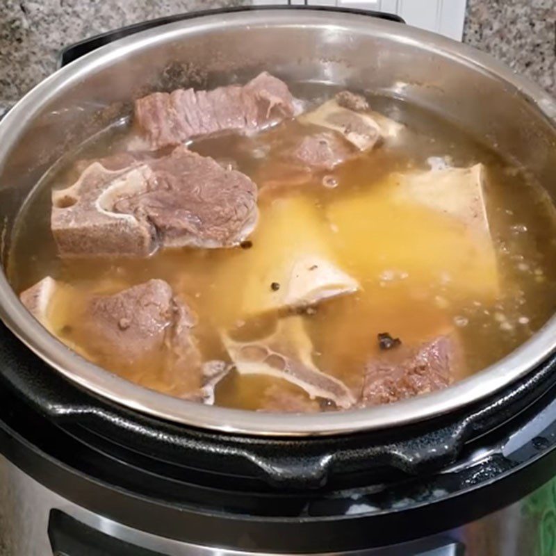 Step 3 Simmering bones for beef pho using a pressure cooker