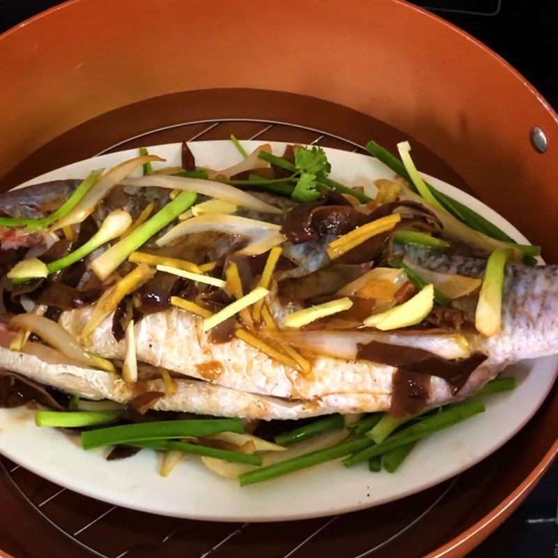 Step 4 Steaming the fish Steamed barramundi with green onion and ginger