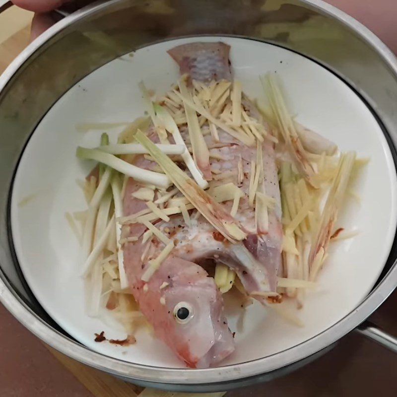 Step 4 Steam the fish Red tilapia steamed with mushrooms