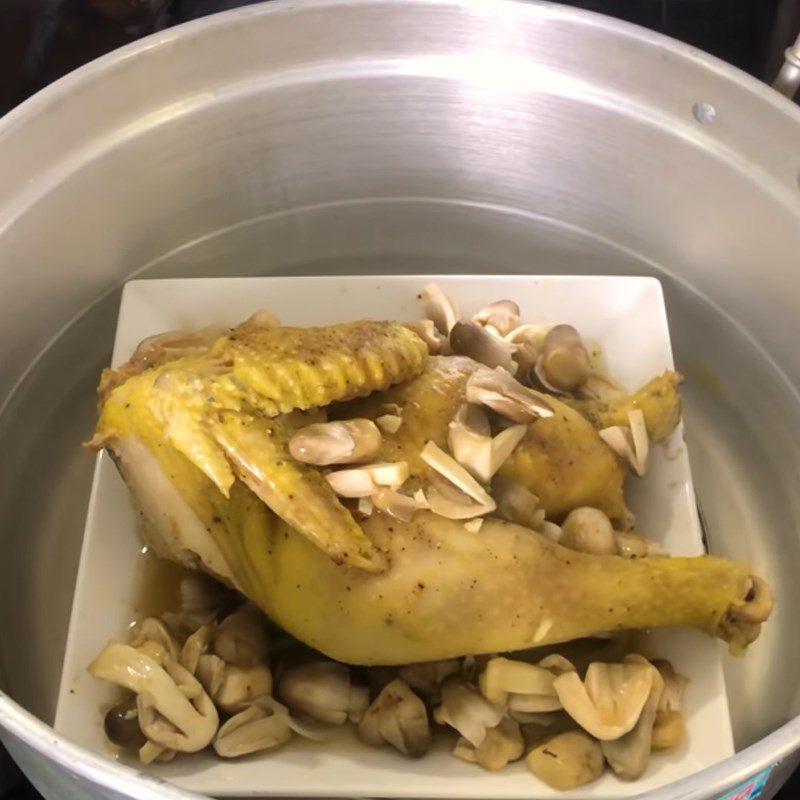 Step 4 Steaming the chicken Steamed chicken with straw mushrooms