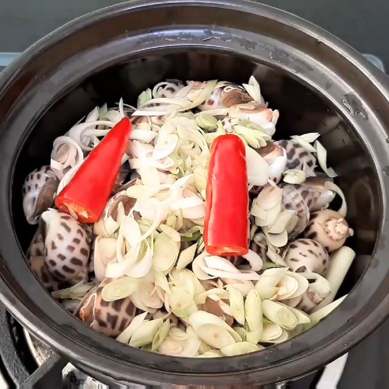 Step 2 Steam razor clams with lemongrass