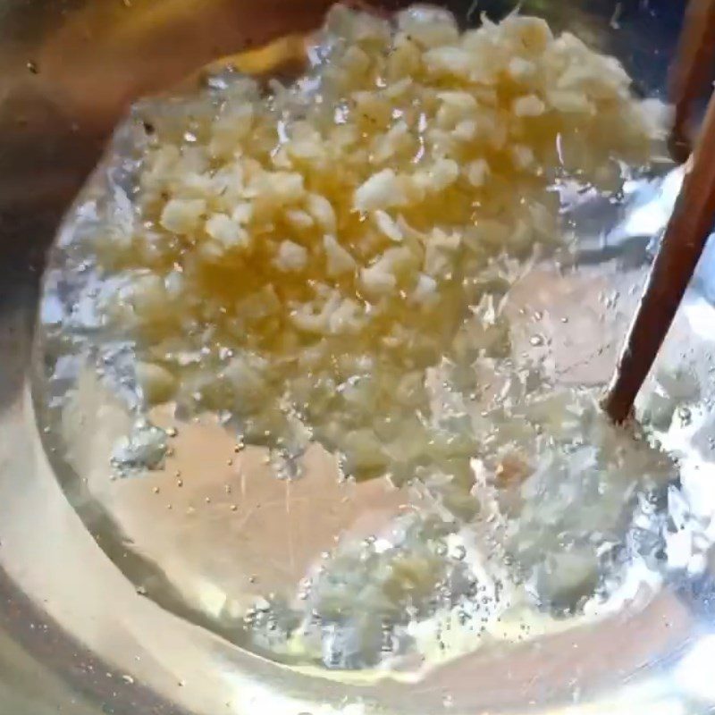 Step 3 Steaming with lemongrass Straw mushrooms steamed with lemongrass and garlic