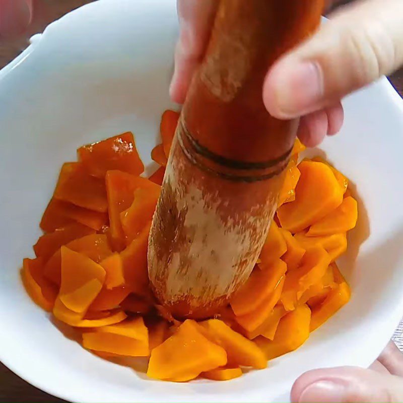 Step 1 Steam and mash the pumpkin Steamed Pumpkin Cake Rolled in Coconut