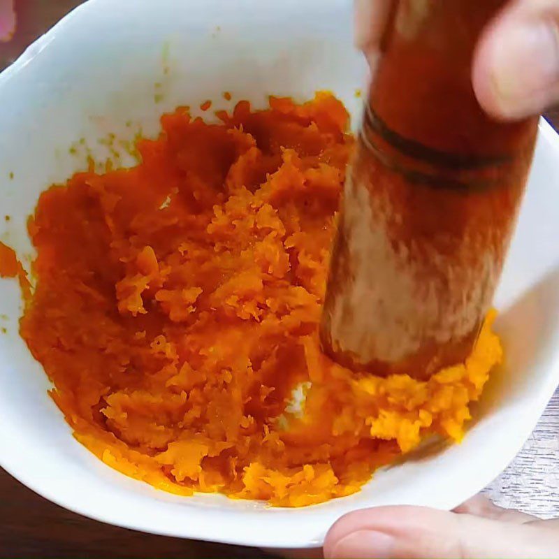 Step 1 Steam and mash the pumpkin Steamed Pumpkin Cake Rolled in Coconut