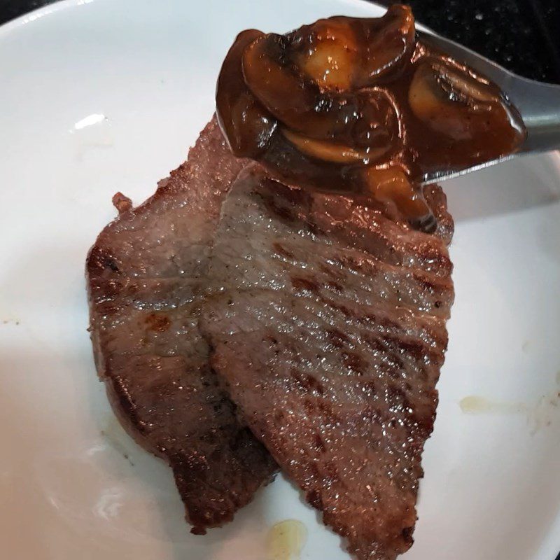 Step 7 Finishing Beef steak with cheese sauce and mushrooms