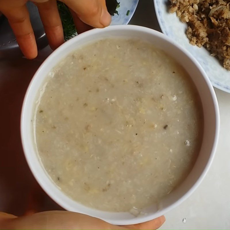 Step 7 Completion Carp porridge with mung beans