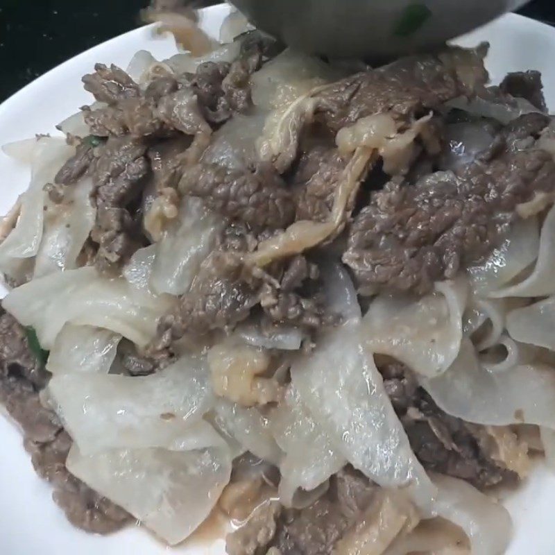 Step 5 Completion Stir-fried radish with beef