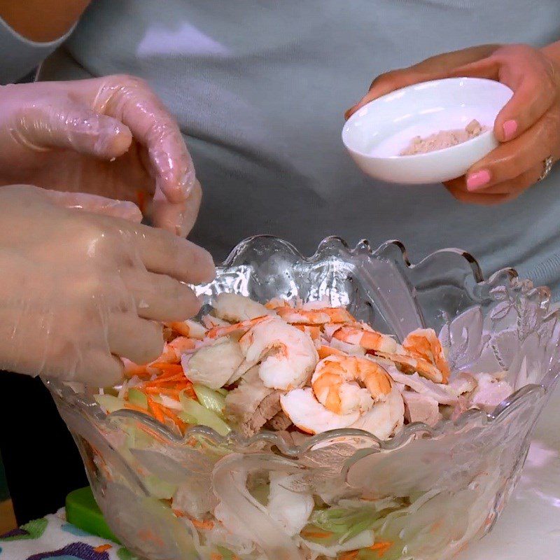 Step 4 Complete the dish Snow mushroom salad with shrimp, pork, and lotus stem