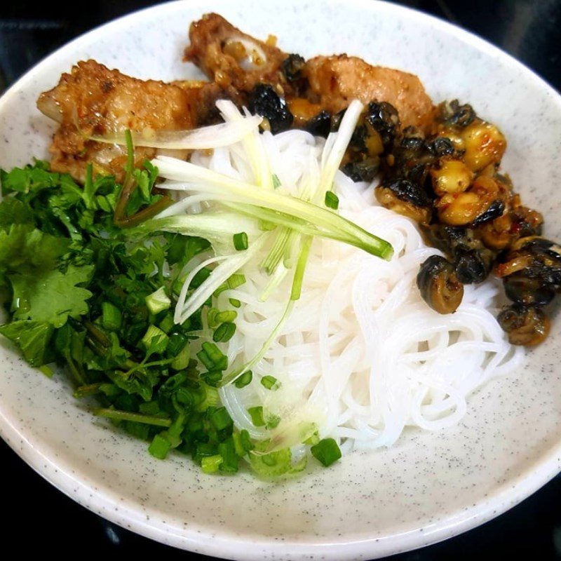 Step 6 Finishing the Dish Snail Vermicelli with Young Ribs and Snails