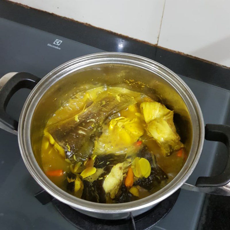 Step 2 Cooking fish Catfish cooked with turmeric