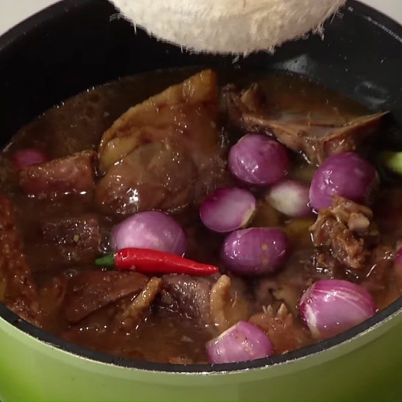 Step 3 Braised duck with coconut heart