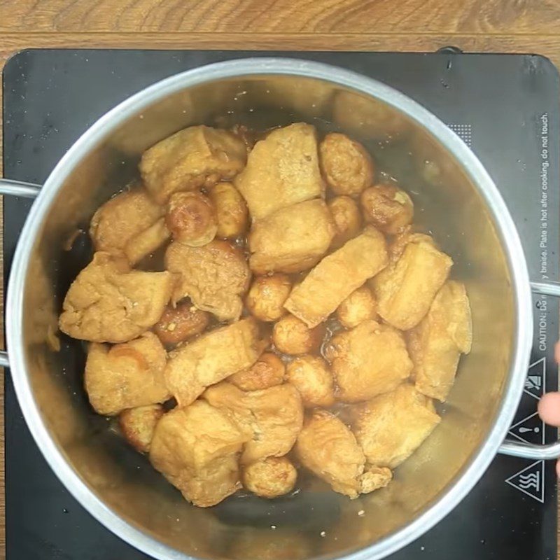 Step 4 Quail Egg Stew Fried quail eggs stewed with tofu