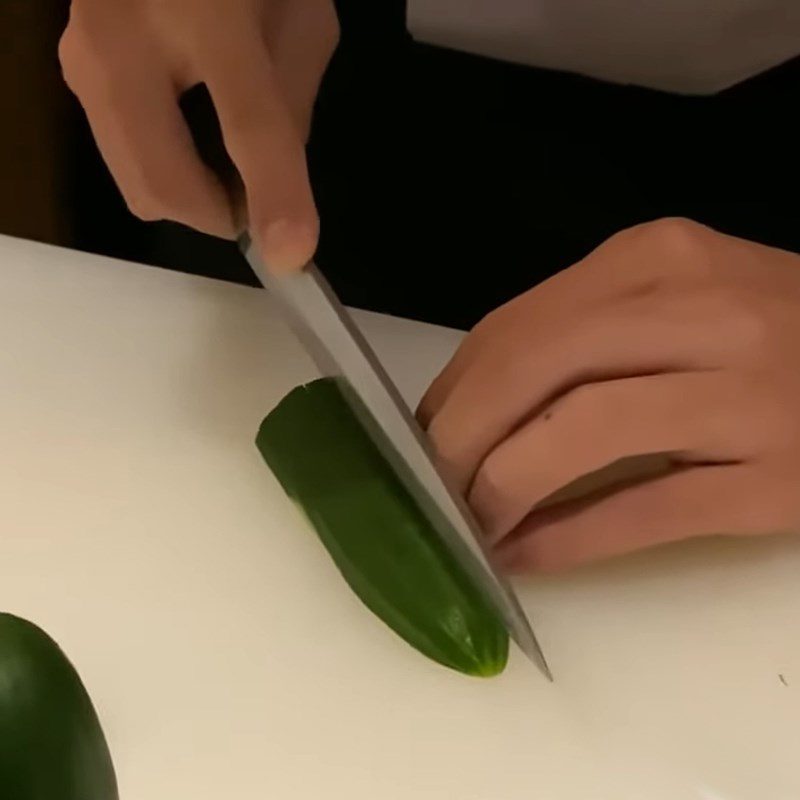 Step 2 Make small cuts in the cucumber Create a Christmas tree shape from cucumber