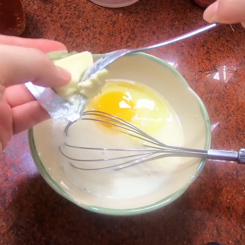 Step 1 Mix the milk mixture Doremon cake with egg, milk, and cheese