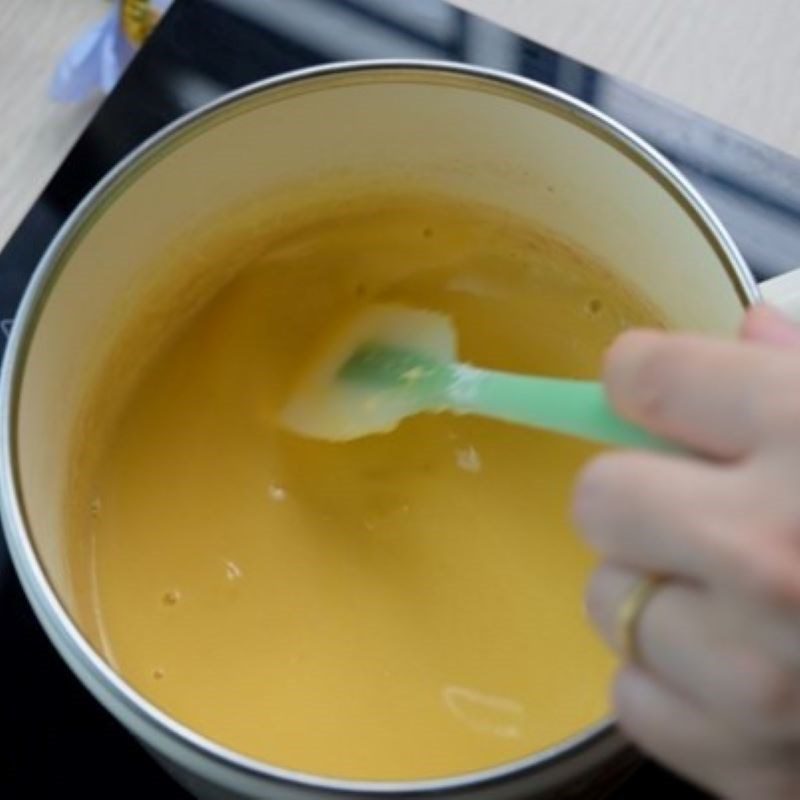 Step 4 Stirring the mixture on the stove Vanilla soufflé egg