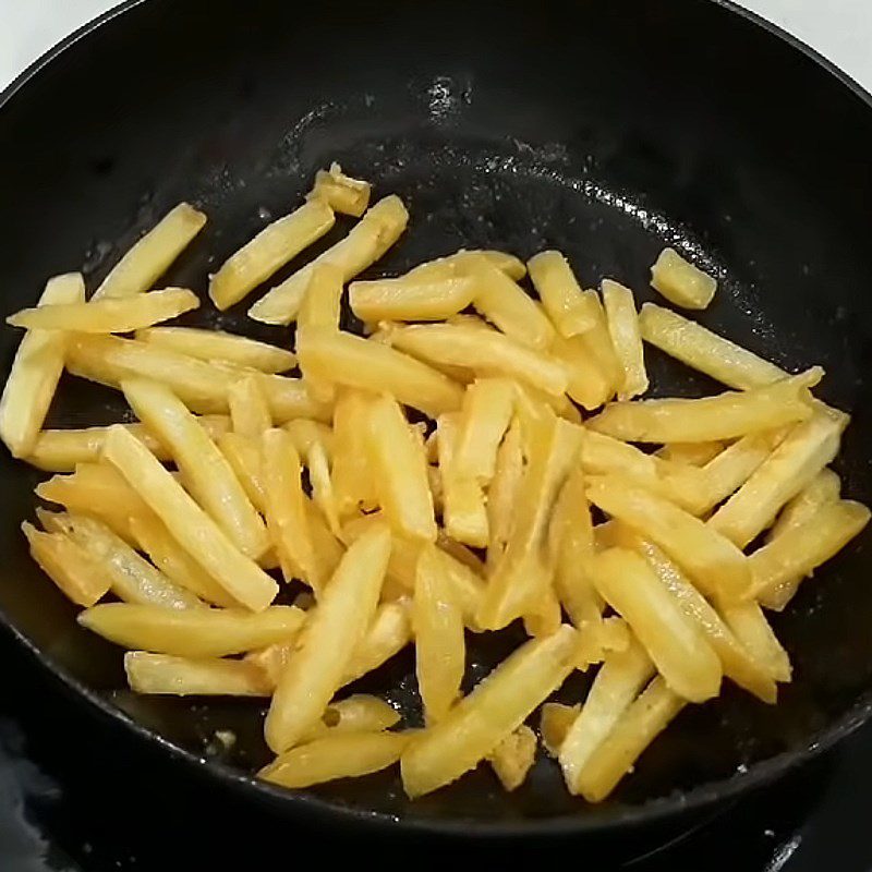 Step 4 Tossing potatoes with sugar Butter fried potatoes