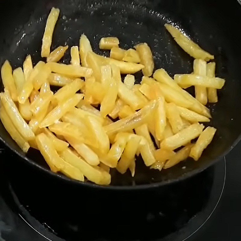 Step 4 Tossing potatoes with sugar Butter fried potatoes