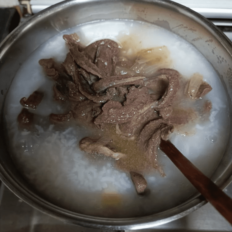 Step 4 Cooking pig heart porridge with potatoes Pig heart porridge cooked with potatoes