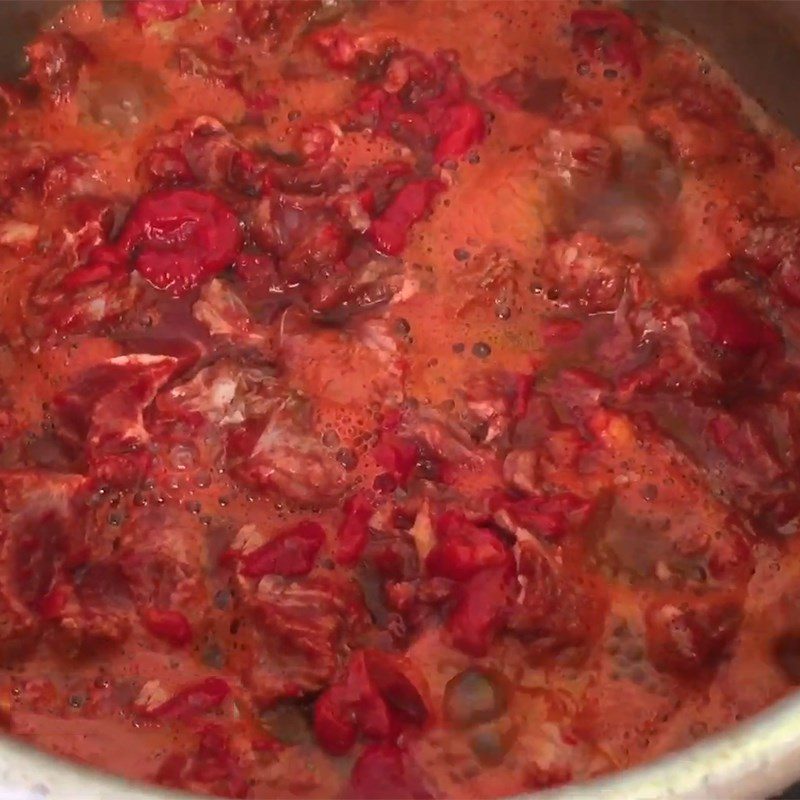 Step 3 Make Gấc beef stew Gấc beef stew