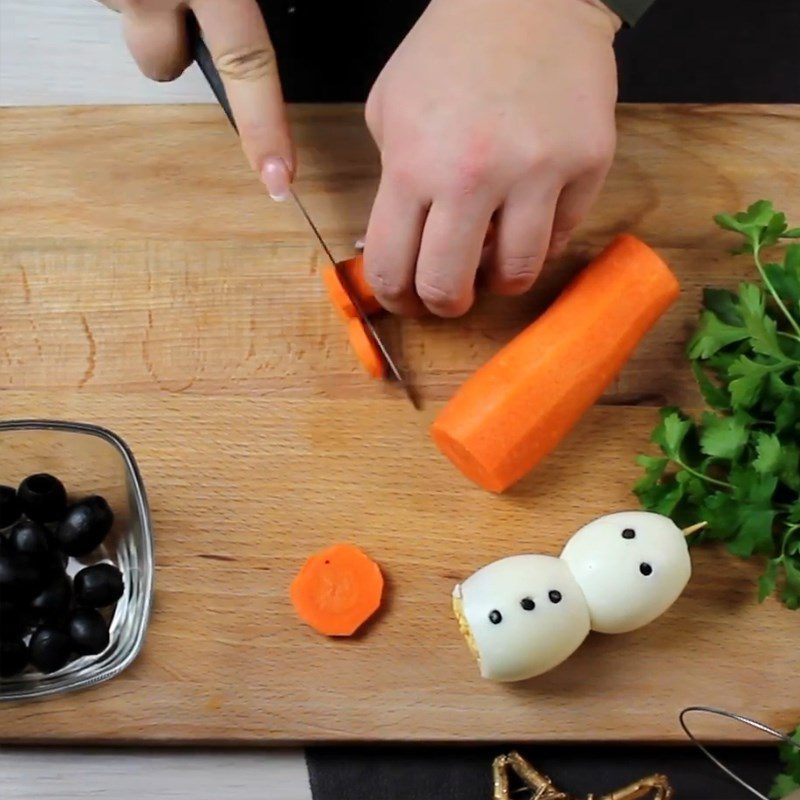 Step 3 Making the hat and nose of the Snowman from quail eggs