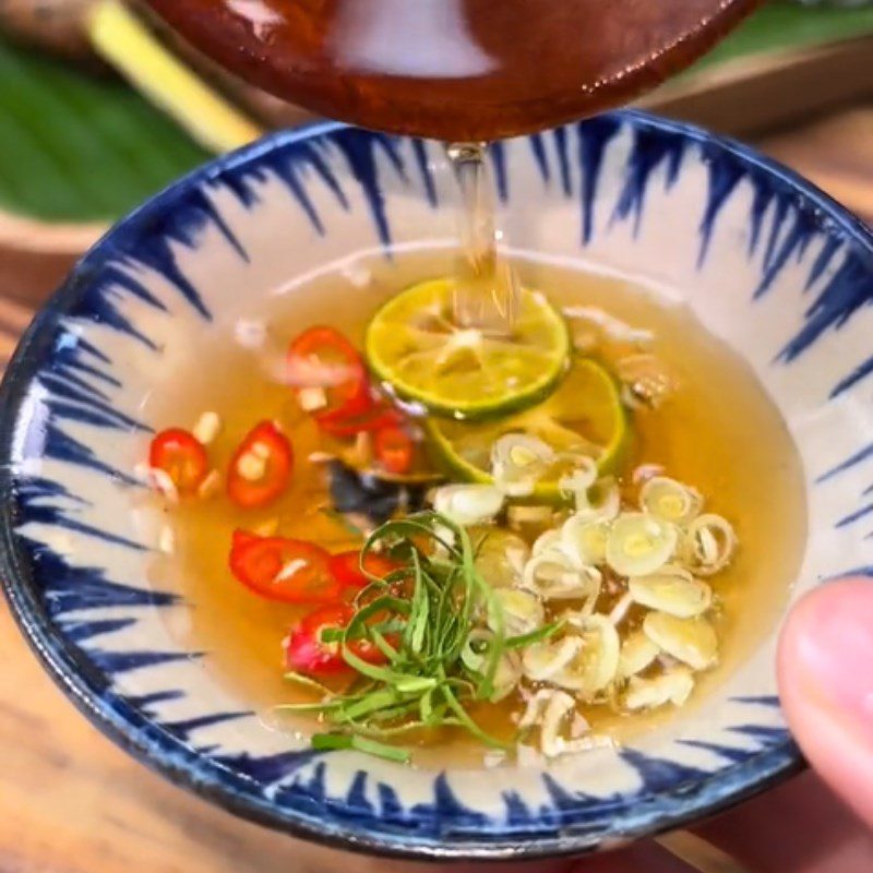 Step 4 Making dipping sauce for grilled snail with betel leaves (Recipe shared from Tiktok Cooking with TasteVN)