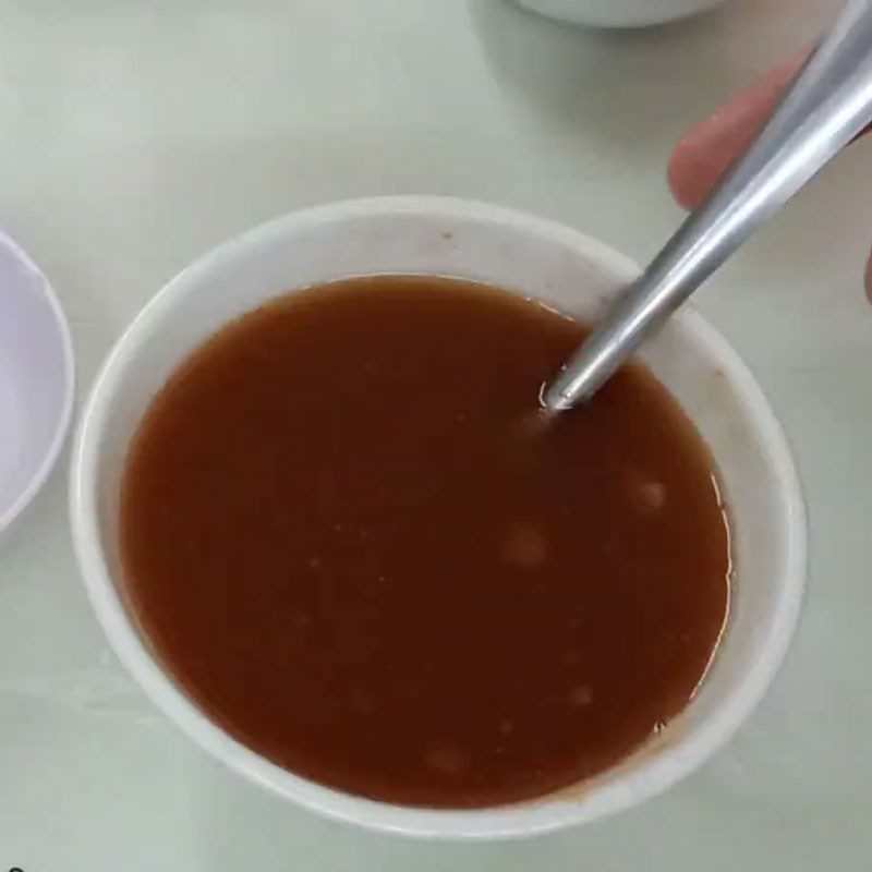 Step 4 Make tamarind fish sauce for the cabbage carrot salad with shrimp and meat