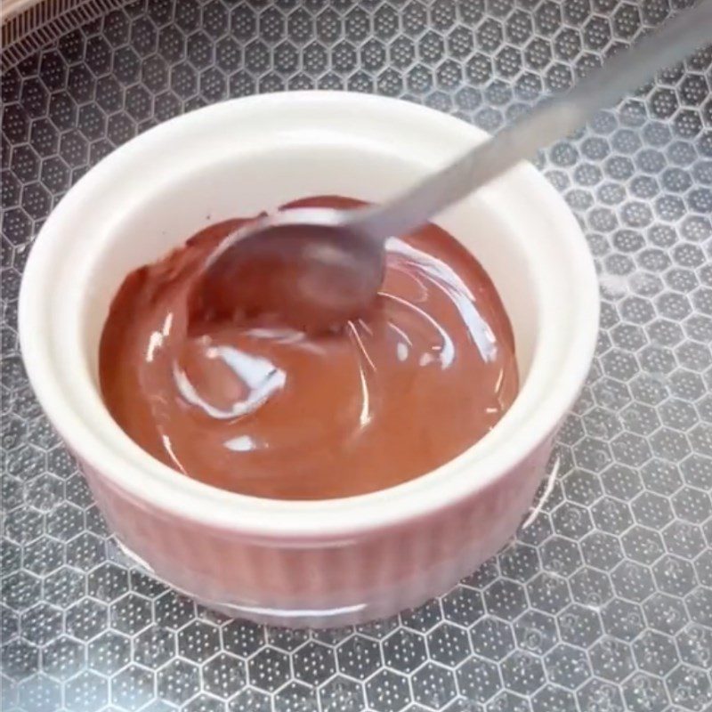 Step 4 Make chocolate sauce for dipping with steamed banana cake Steamed banana cake dipped in coconut milk and chocolate