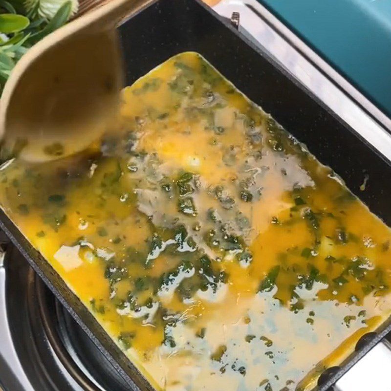 Step 3 Making fried eggs with Vietnamese mugwort leaves Fried eggs with Vietnamese mugwort leaves (Recipe shared from TikTok Cooking with TasteVN)