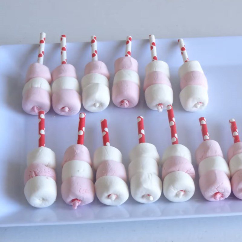 Step 1 Making marshmallow skewers Chocolate-dipped marshmallow candy