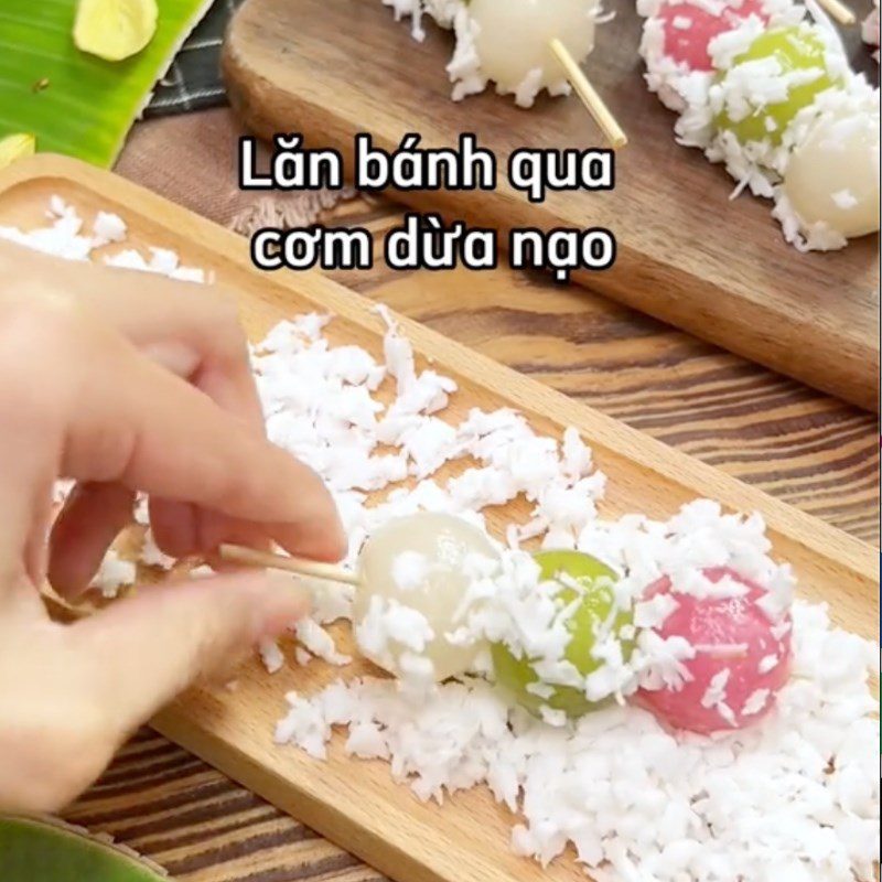 Step 6 Rolling the cake in grated coconut Cake skewer with sesame salt