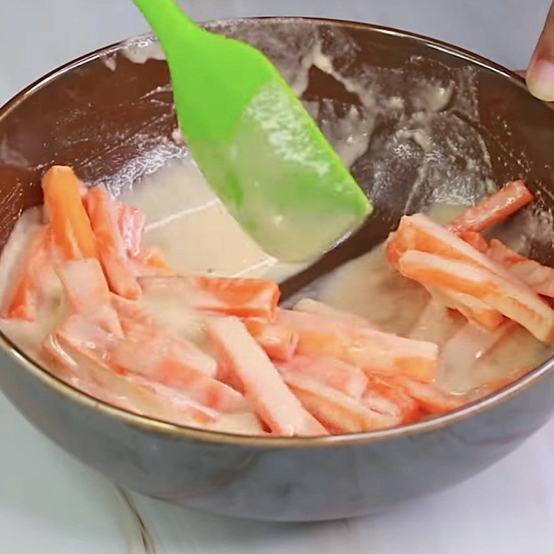 Step 3 Dip the carrots in the flour for carrot chips