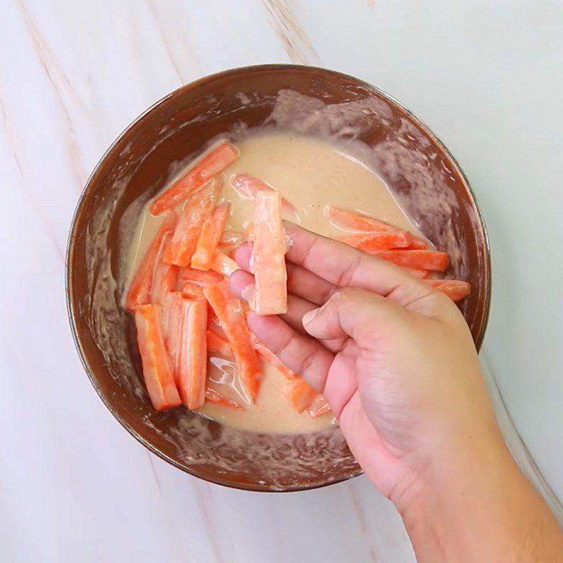 Step 3 Dip the carrots in the flour for carrot chips