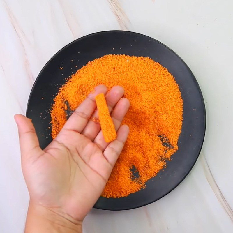 Step 3 Roll the carrot in carrot snack powder