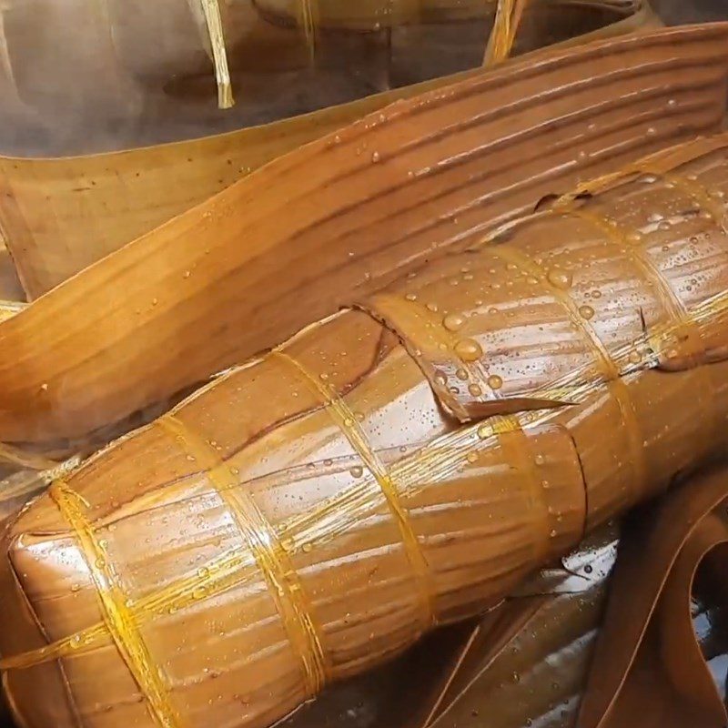 Step 8 Boiling the Gấc Sticky Rice Cake