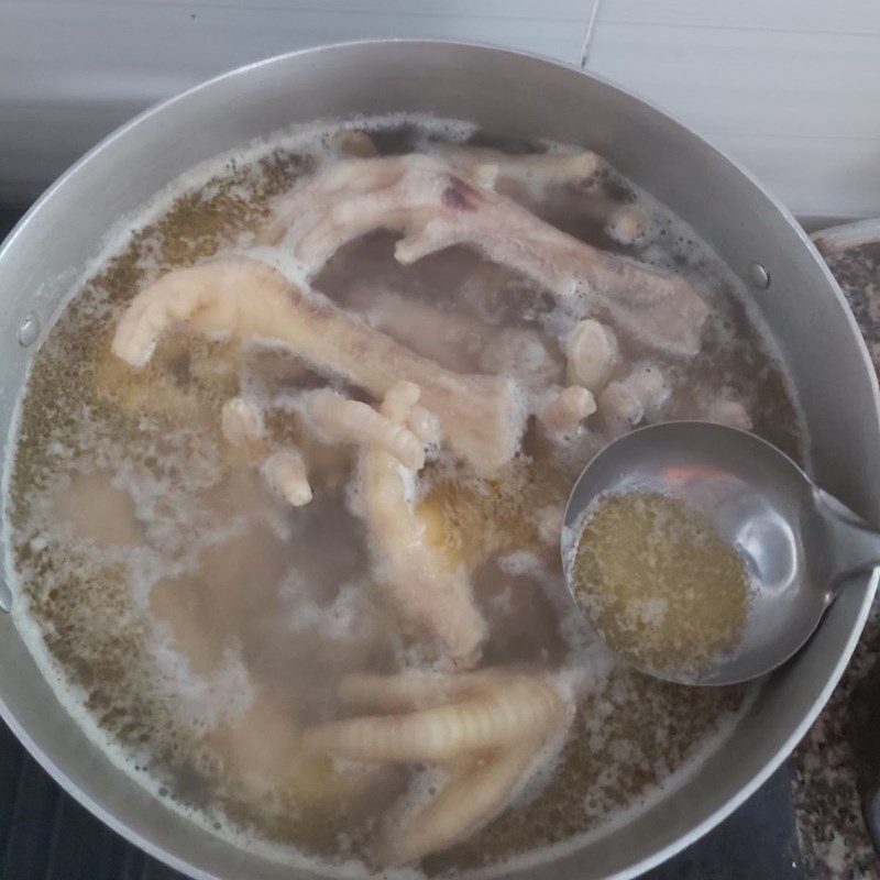 Step 3 Boil chicken feet Chicken feet soaked in lemongrass and calamansi