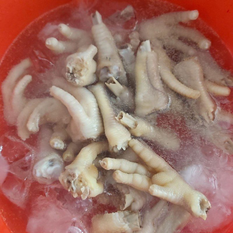 Step 3 Boil chicken feet Chicken feet soaked in lemongrass and calamansi