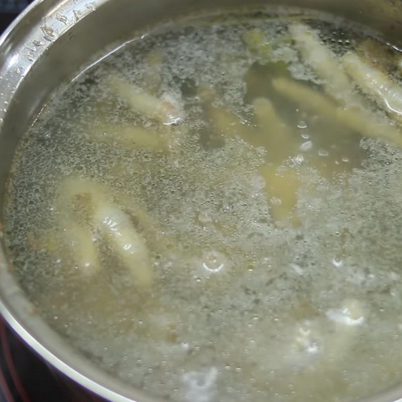 Step 2 Boiling chicken feet Chicken feet soaked in fish sauce