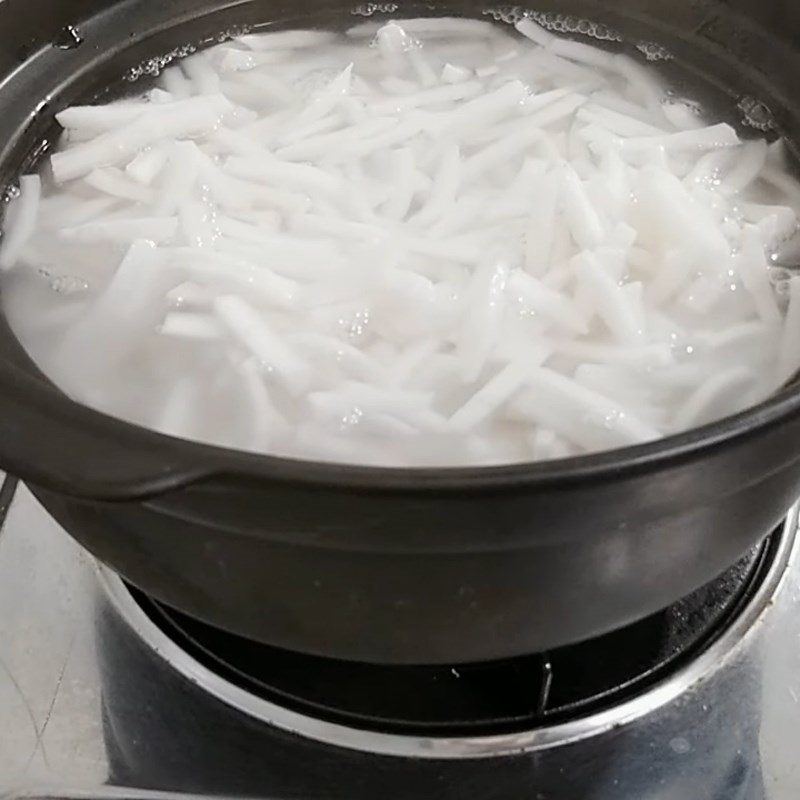 Step 2 Boil the Coconut Meat for Coconut Braised in Soy Sauce