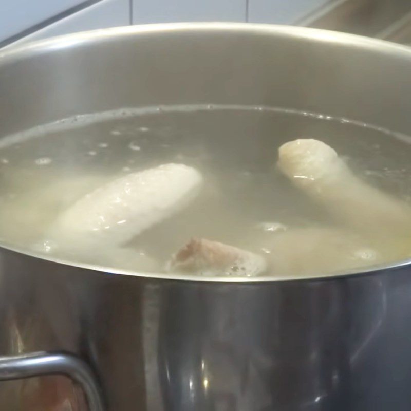 Step 2 Boil the chicken for Spicy Chicken Noodles