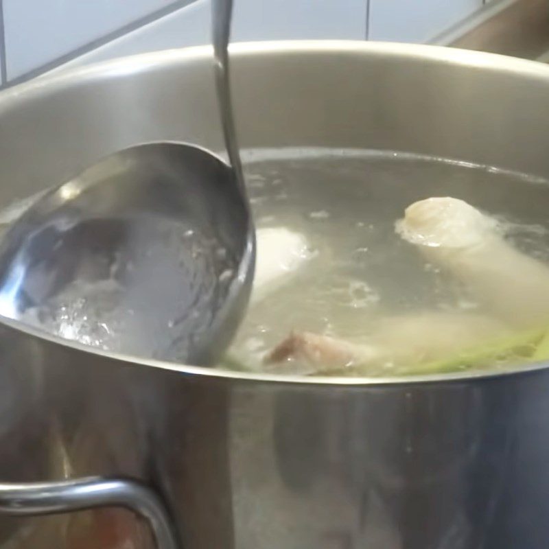 Step 2 Boil the chicken for Spicy Chicken Noodles