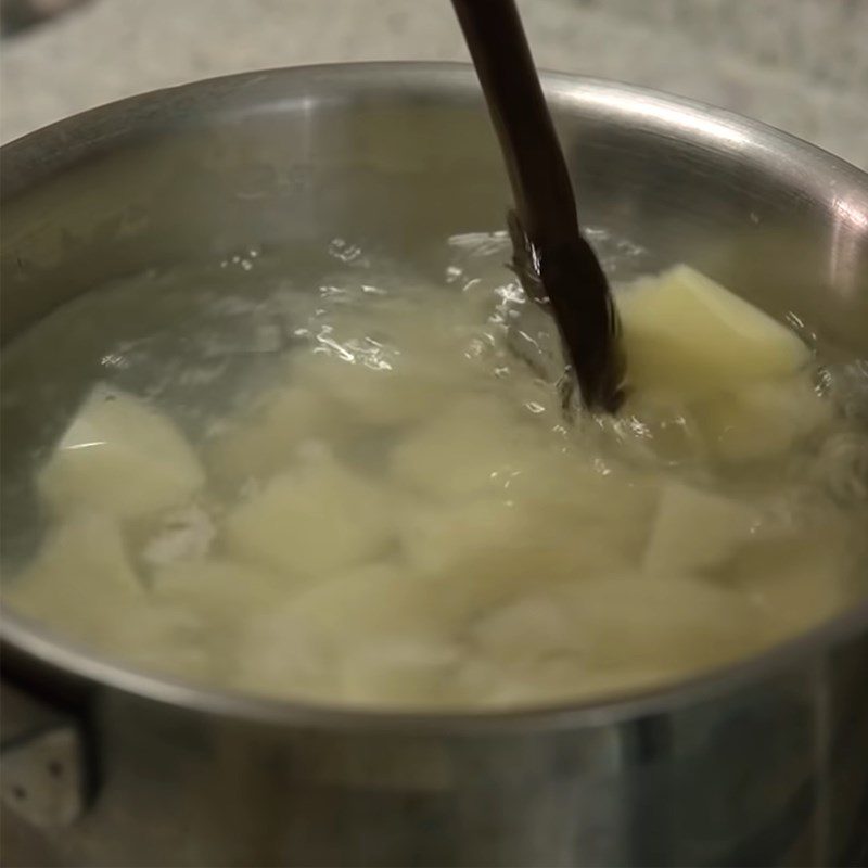 Step 1 Boil the potatoes Potato Cheese Bread in a pan